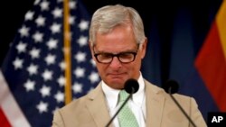 Rick Davis, spokesperson for Sen. John McCain's family, reacts as he speaks to the media during a news conference, Aug. 27, 2018, in Phoenix, Arizona.