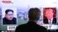 A man watches a TV screen showing file footage of President Trump, right, and North Korean leader Kim Jong Un at the Seoul Railway Station in Seoul, South Korea, May 16, 2018.
