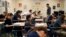 In this Nov. 16, 2017, photo, students take a quiz in Michael Briggs' seventh grade algebra class at Lake Mead Christian Academy in Henderson, Nev. (AP Photo/John Locher)
