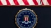 FILE - In this June 14, 2018, photo, the FBI seal is seen at FBI headquarters in Washington. 