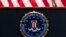 FILE - In this June 14, 2018, photo, the FBI seal is seen at FBI headquarters in Washington. 