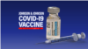 Un frasco de la vacuna Johnson & Johnson contra el COVID-19, producida por Janssen Pharmaceuticals, con una jeringuilla.