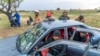 Relatives of miners and community members wait near the shaft of a closed mine where illegal miners are inside in Stilfontein, South Africa, Nov. 14, 2024. 