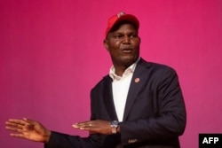 FILE - Daniel Chapo, Frelimo party presidential candidate, addresses a meeting with supporters in Maputo, Mozambique, on Oct. 2, 2024. Chapo was declared the winner of the presidential vote on Oct. 24, 2024. Opposition figures say the election was rigged.