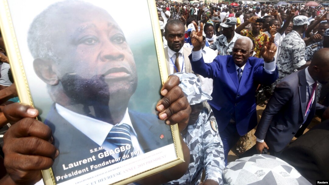 FILE - Aboudramane Sangare of the Ivorian Popular Front (FPI) arrives for a rally of the opposition National Coalition for Change (CNC) in Koumassi, a district of Abidjan, June 27, 2015. 