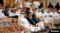 Prime Minister and Vice-President of the United Arab Emirates and ruler of Dubai Sheikh Mohammed bin Rashid al-Maktoum, Imran Khan, Prime Minister of Pakistan,Saudi Arabia Minister of State Ibrahim Abdulaziz Al-Assaf, attend a conference in Riyadh, S. Arabia, Oct. 23, 2018. 