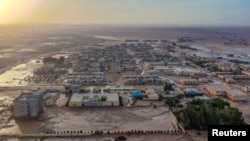 FILE - General view of flood water covering the area as a powerful storm and heavy rainfall hit Al-Mukhaili, Libya September 11, 2023, in this handout picture. 