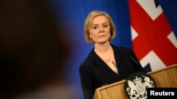 FILE PHOTO: British Prime Minister Liz Truss attends a news conference in London