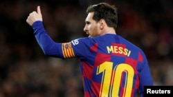 Dan wasan Barcelona Lionel Messi