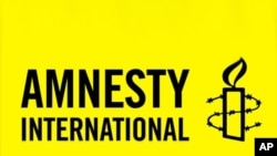 ເຄື່ອງໝາຍຂອງອົງການນິລະໂທດກຳສາກົນ ຫຼື Amnesty International 