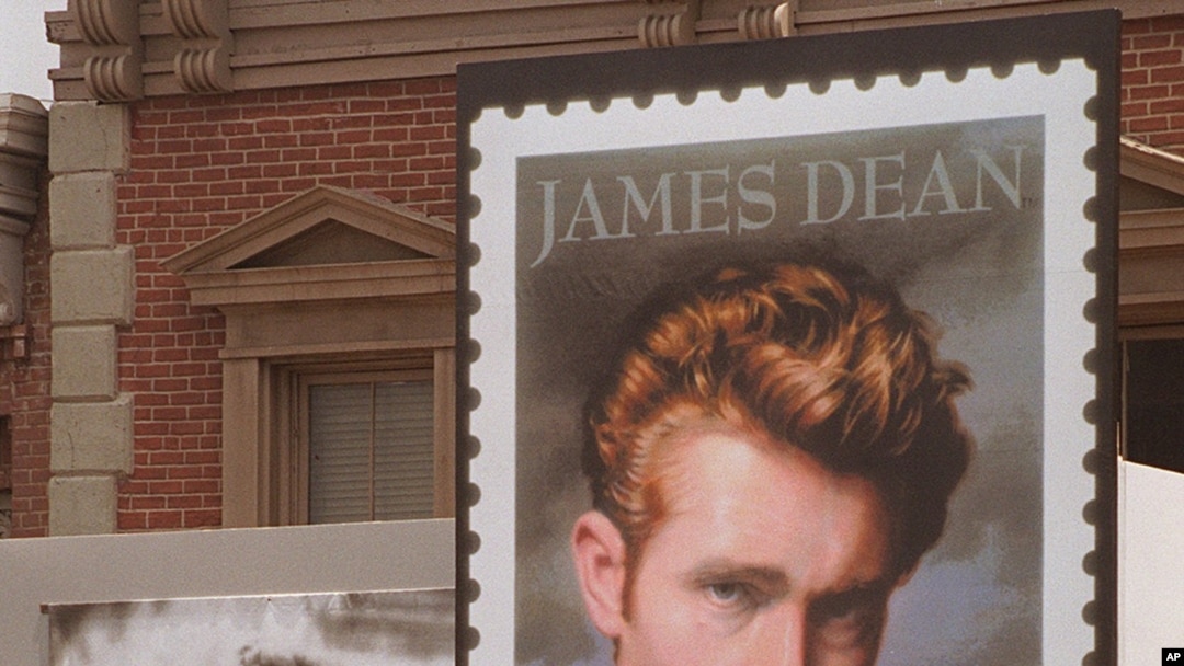 Postal and film industry officials view the unveiling of the new James Dean stamp at a ceremony, June 24, 1996 on the lot where Dean filmed "East of Eden" and "Rebel Without a Cause," at Warner Bros. Studios in Burbank, Calif. 