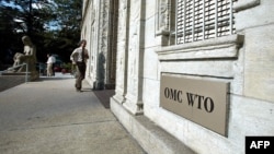FILE - The entrance of the World Trade Organization (WTO) headquarter in Geneva, Switzerland. 
