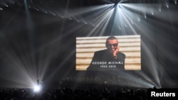 Chris Martin of Coldplay performs a tribute to George Michael at the Brit Awards at the O2 Arena in London, Feb. 22, 2017. 