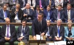 This video grab taken from footage broadcast by the UK Parliamentary Recording Unit (PRU), shows British Prime Minister David Cameron giving a statement in Parliament in London on June 27, 2016 following the EU referendum.