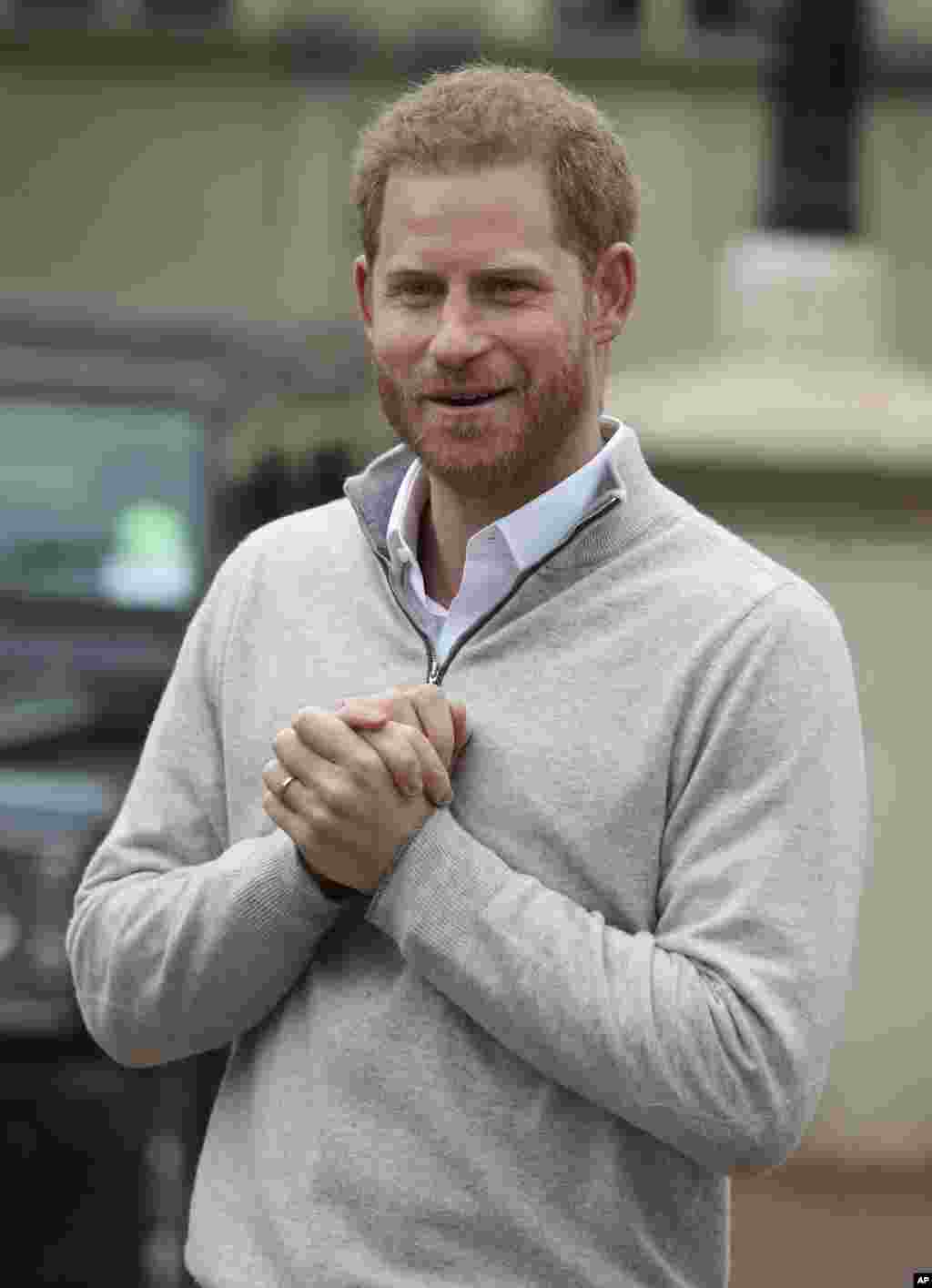 Britain&#39;s Prince Harry speaks to the members of the media at Windsor Castle, Windsor, England, after his wife Meghan, the Duchess of Sussex gave birth to a baby boy.