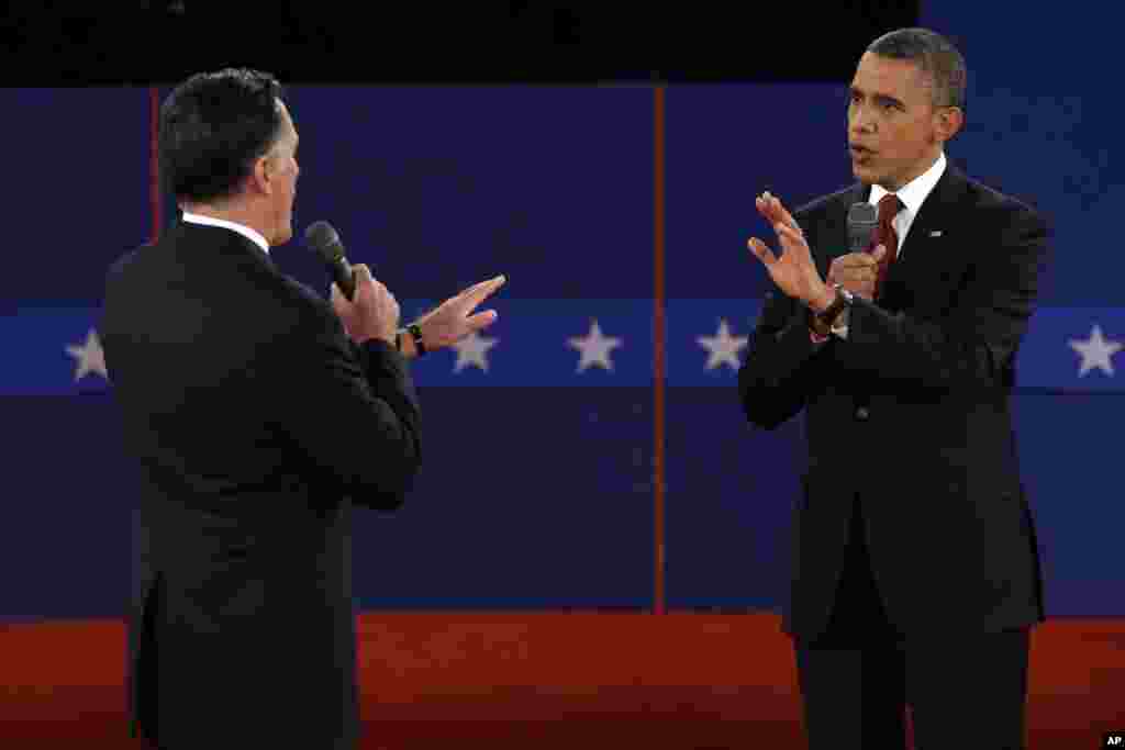 Republican presidential nominee Mitt Romney and President Barack Obama spar over energy policy during the second presidential debate at Hofstra University, October 16, 2012.