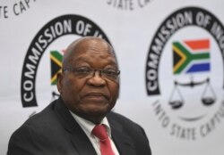 FILE - Former South Africa President Jacob Zuma appears before a commission probing allegations of corruption, in Johannesburg, July 15, 2019.