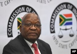 FILE - Former South Africa President Jacob Zuma appears before a commission probing allegations of corruption, in Johannesburg, July 15, 2019.