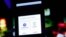A projection screen displays the new Facebook Home software for Android during a Facebook press event, in Menlo Park, California, April 4, 2013. 