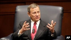 FILE - Supreme Court Chief Justice John Roberts answers questions during an appearance at Belmont University, Feb. 6, 2019, in Nashville, Tennessee. 