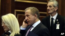 Newly chosen Kosovo president Behgjet Pacolli (center)