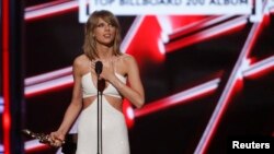 Taylor Swift accepts the award for Top Billboard 200 Album for "1989" at the 2015 Billboard Music Awards in Las Vegas, Nevada, May 17, 2015. 