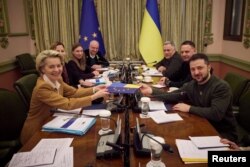 Ukraine's President Zelenskiy and European Commission President von der Leyen attend a meeting ahead of EU summit in Kyiv