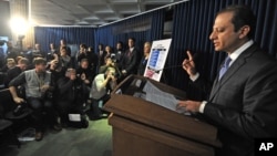 U.S. Attorney Preet Bharara speaks at a press conference concerning a case in which federal prosecutors say hedge fund giant SAC Capital Advisors has agreed to plead guilty to fraud charges and to pay a $1.8 billion financial penalty, in New York, Nov. 4,