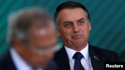 Brazil's President Jair Bolsonaro attends a ceremony at the Planalto Palace in Brasilia, Brazil, Jan. 7, 2019.