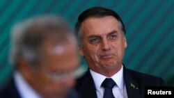 Brazil's President Jair Bolsonaro attends a ceremony at the Planalto Palace in Brasilia, Brazil, Jan. 7, 2019.