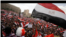 Protesters wave the Egyptian flag in Tahrir Square in Cairo, Egypt, Friday, April 8, 2011.