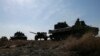 우크라이나 정부군, 동부 전선서 무기 철수 개시