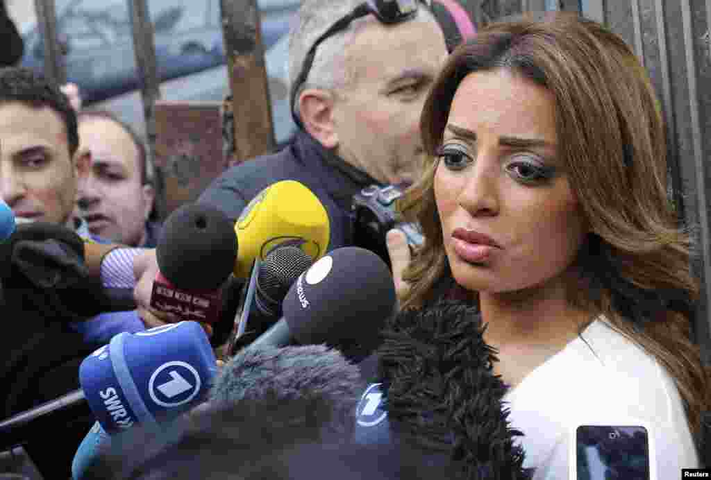 Marwa Omara, fiancee of Canadian-Egyptian Mohamed Fahmy, one of the journalists working for Al Jazeera television, speaks to the media in front of a court in Cairo, Jan. 1, 2015.&nbsp;