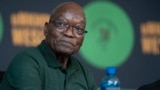 (FILES) Former South African president Jacob Zuma attends a press briefing at the YMCA Community Hall in Soweto on December 16, 2023.
