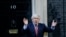 Britain's Prime Minister Boris Johnson applauds on the doorstep of 10 Downing Street in London during the weekly "Clap for our Carers",  May 28, 2020. 