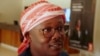 FILE - Former Prime Minister and presidential candidate Umaro Cissoko Embalo chats with his supporters and members of his campaign team, after the results of the first-round poll, at a hotel lobby in Bissau, Guinea-Bissau, Nov. 27, 2019. 