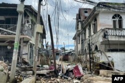 This photo taken on Aug. 10, 2024 shows destroyed and damaged buildings in Lashio in Myanmar's northern Shan State, following fighting between Myanmar's military and Myanmar National Democratic Alliance Army (MNDAA) in the region.