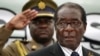 FILE - Zimbabwe President Robert Mugabe attends the launch of basic commodities in Harare, Zimbabwe.