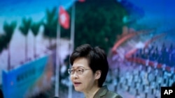Hong Kong Chief Executive Carrie Lam speaks during a press conference in Hong Kong, April 13, 2021. Lam said Tuesday that Hong Kong's legislative elections would take place in December.