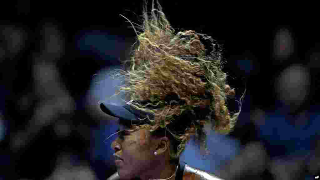 Naomi Osaka of Japan watches her return to Sloane Stephens of the United States during their women's singles match at the WTA tennis tournament in Singapore.