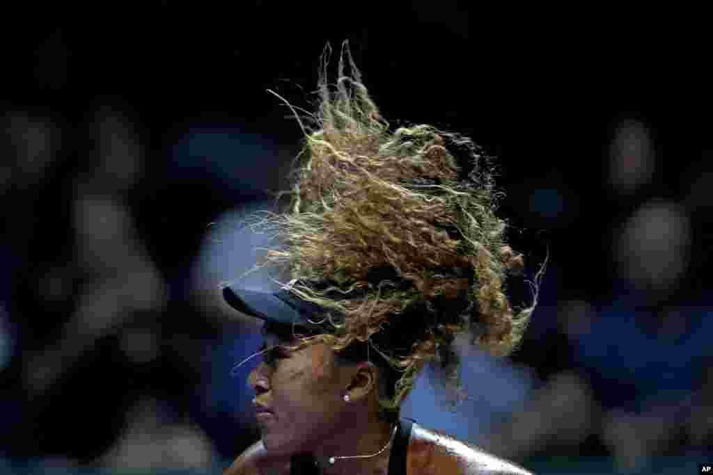 Naomi Osaka of Japan watches her return to Sloane Stephens of the United States during their women&#39;s singles match at the WTA tennis tournament in Singapore.