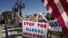 Demonstrators chant during an "America First" rally at the San Ysidro Port of Entry along the United States-Mexico border in San Ysidro, California, December 15, 2018.