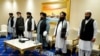 FILE - Members of a Taliban peace negotiation team are pictured in Doha, Qatar, Nov. 21, 2020.