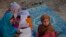 Pashtun girls, their homes destroyed by heavy floods, practice the Arabic alphabet and reciting the Koran at a camp for the internally displaced in Charsadda, in Pakistan's Khyber Pakhtunkhwa province, September 26, 2010. Summer floods have killed more th