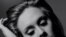Adele Continues to Top Charts With '21'
