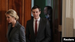 FILE - White House senior advisor Jared Kushner enters the East Room with his wife Ivanka Trump, prior to a joint news conference between President Donald Trump and Israeli Prime Minister Benjamin Netanyahu, at the White House in Washington, Feb. 15, 2017. 