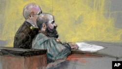 In this courtroom sketch, Maj. Nidal Hasan, right, appears at the Lawrence William Judicial Center during the sentencing phase of his trial, Aug. 27, 2013, in Fort Hood, Texas. 