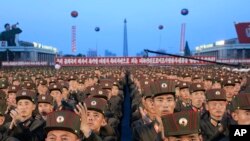 FILE - Soldiers gather in Kim Il Sung Square in Pyongyang, North Korea, July 6, 2017, to celebrate the test launch of North Korea's first intercontinental ballistic missile two days earlier.
