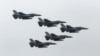 FILE - Taiwan Air Force's F-16 fighter jets fly during the annual Han Kuang military exercise at an army base in Hsinchu, northern Taiwan, July 4, 2015.