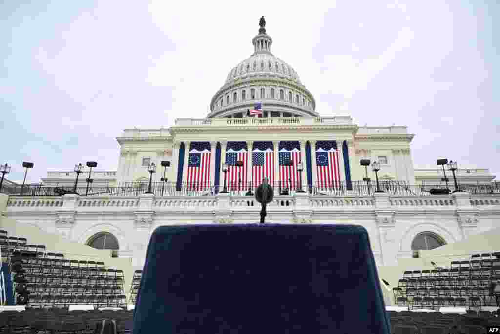 A lectern and microphone is seen on a stage on the West Front of the U.S. Capitol, where the presidential inauguration traditionally takes place, in Washington, D.C.